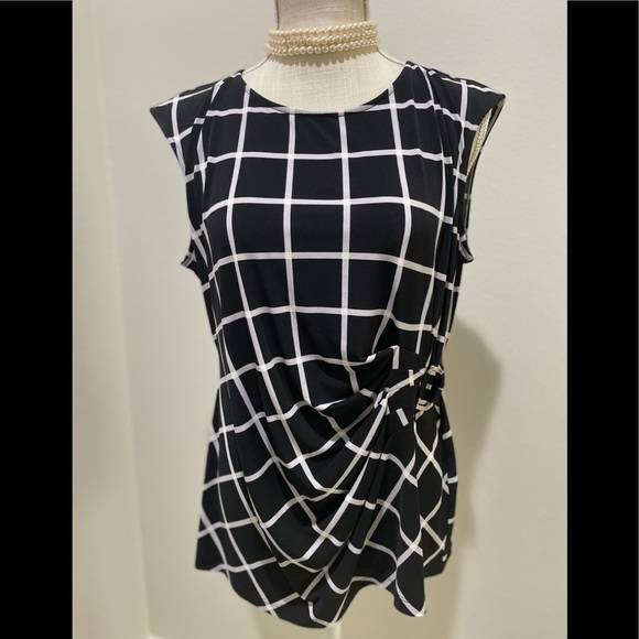 Calvin Klein Tops - NWT Calvin Klein Sleeveless top black & white with silver side clasp Siz…
